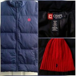 Puffer blues vest with a red hat.